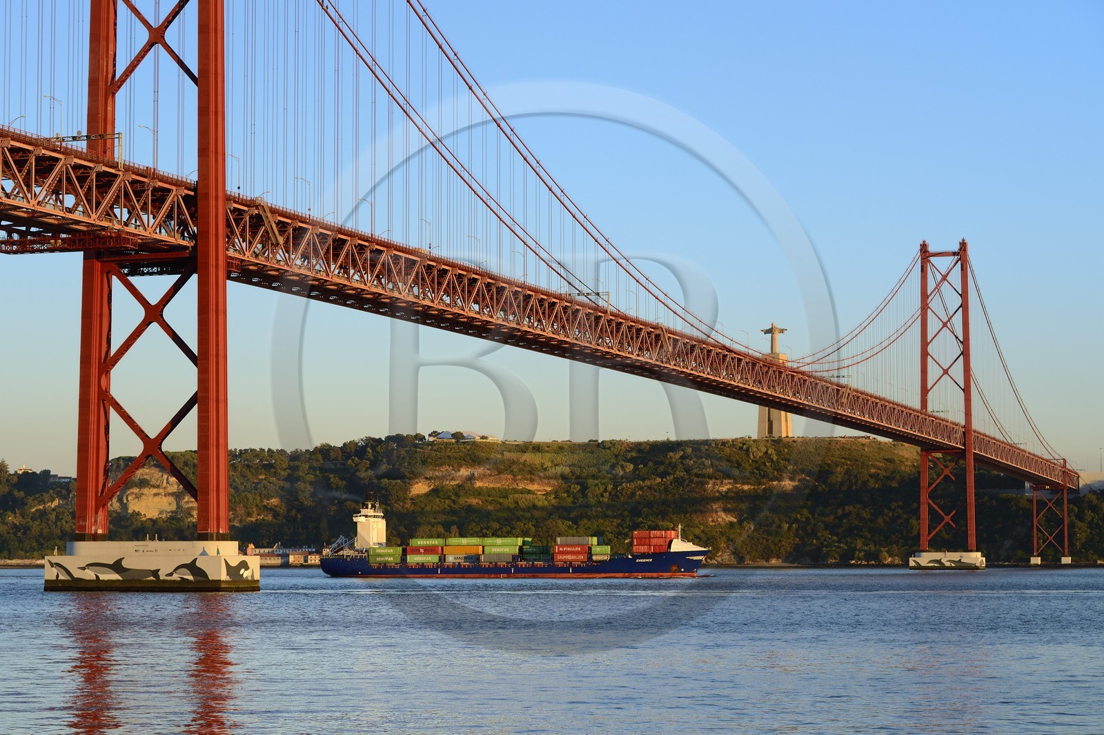 Portugal, Lisbon, 25 de Abril bridge on Tagus river and the Cristo Rei (Christ the King)