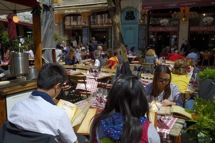France, Rhone, Lyon, historical site listed as World Heritage by UNESCO, St. Paul neighborhood in the Vieux Lyon (Old Town), Place du Change and Bouchons Lyonnais (typical and traditional restaurants of Lyon)