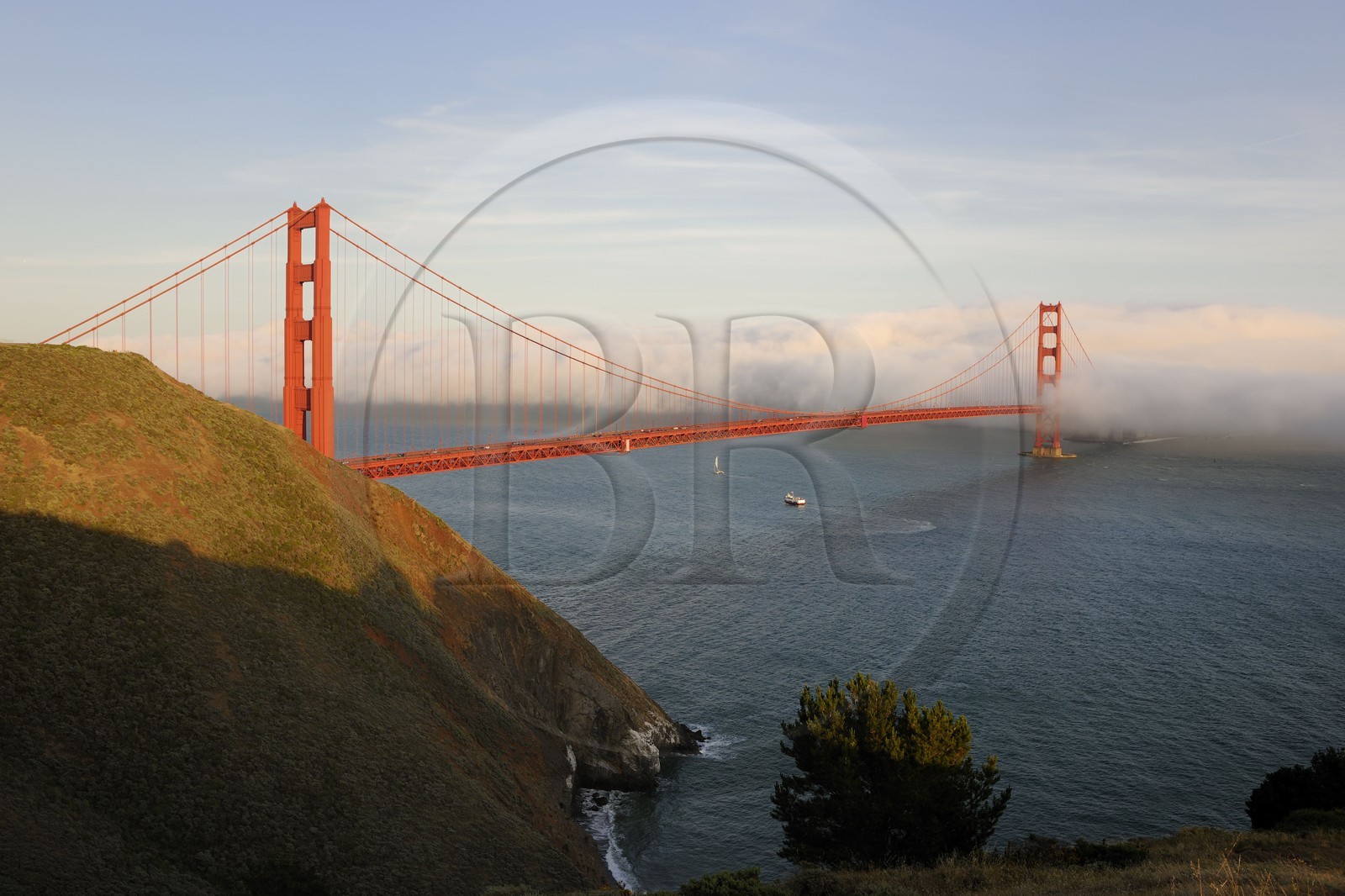 United States, California, San Francisco, Golden Gate Bridge rising above the fog