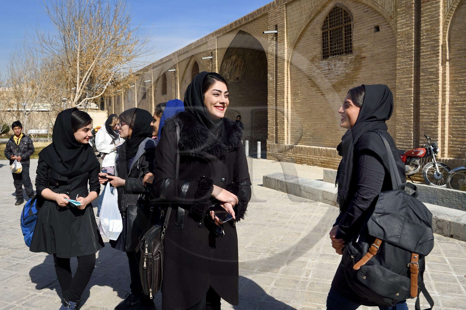 Iran, Isfahan Province, Isfahan, young Iranian women near the naghsh-i jahan square also known as Imam Khomeiny square