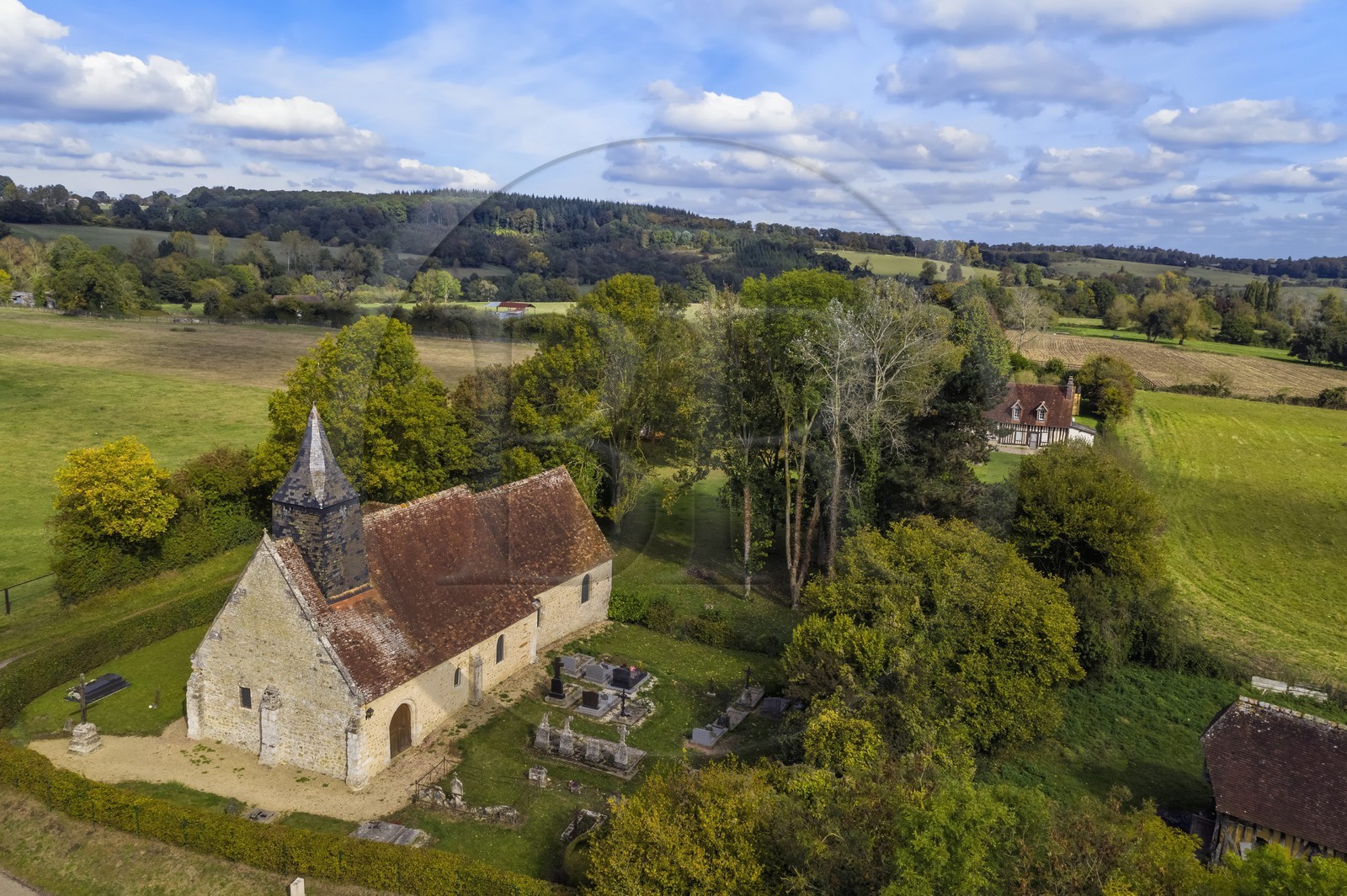 France, Orne, Pays d'Auge, Ecorches, St-Saturnin Church of the Lignerits of the twelfth century restored in the seventeenth century, Charlotte Corday (great-great-great-granddaughter of Pierre Corneille) was baptized there (aerial view)