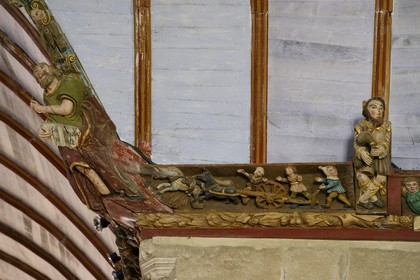 France, Finistere, Pleyben church, wooden painted sculptures on the stringer decorating the vault