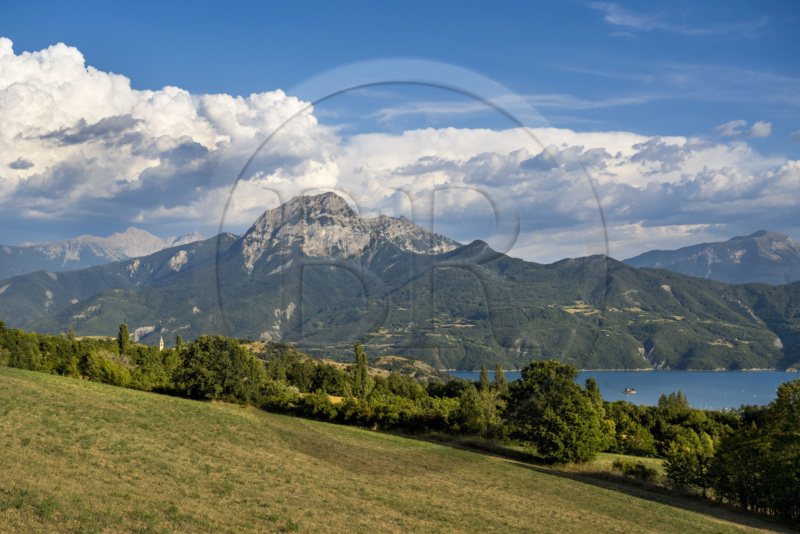 France, Hautes Alpes, Prunières, panorama of Lake Serre-Ponçon and the summit of Pic de Morgon (2324 m) in the background
