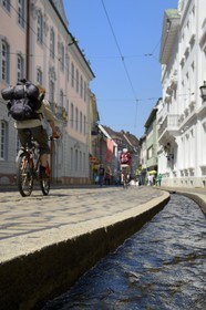Germany, Baden-Wurttemberg, Freiburg im Breisgau, Salzstrasse, one of the Bächle which are small open channel lining the sidewalks of the old town
