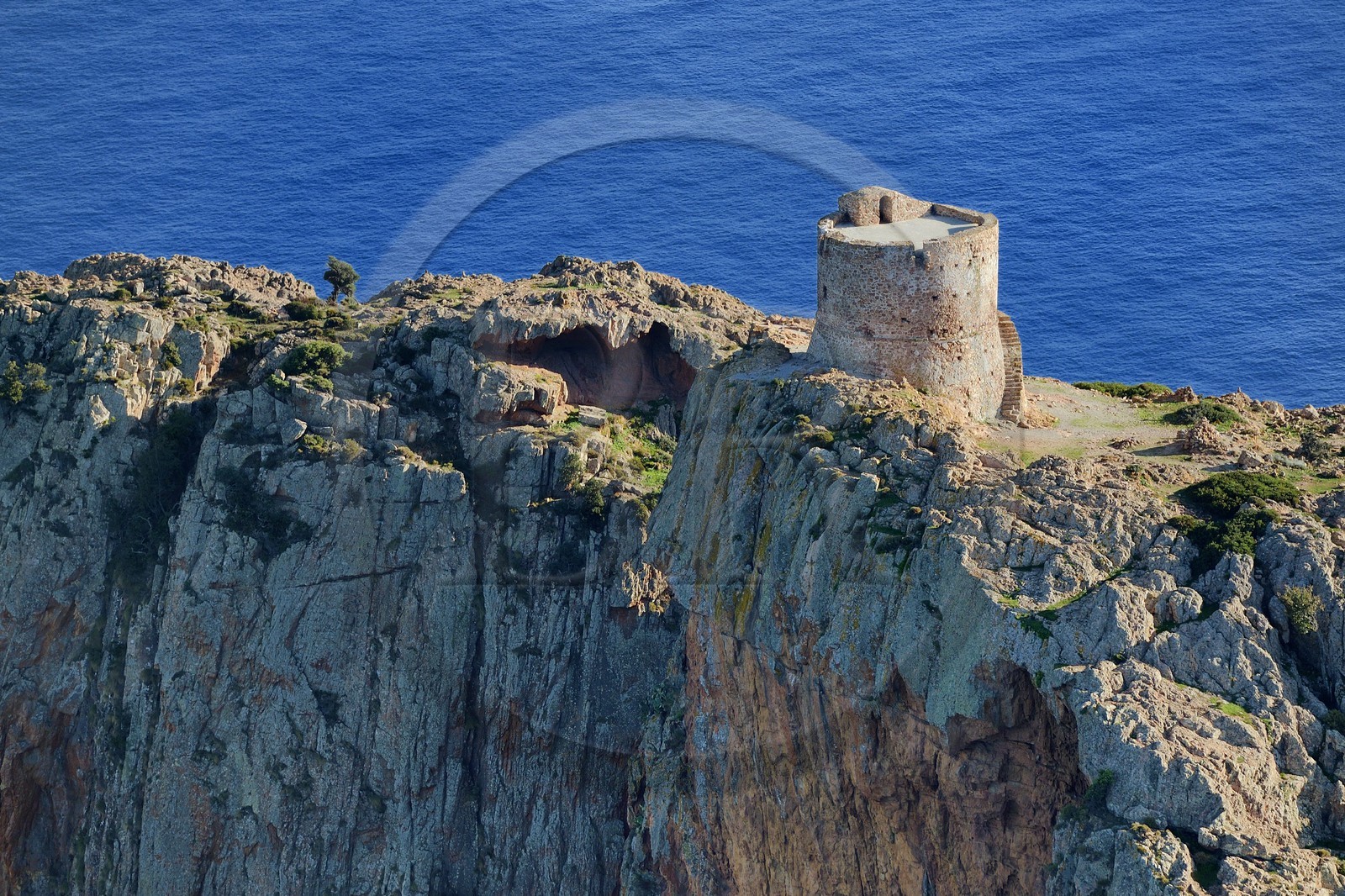 France, Corse du Sud, Golfe de Porto, listed as World Heritage by UNESCO, the Capo Rosso and the Genovese Tower of Turghiu (Turghio) in the background (aerial view)