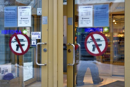Norway, Svalbard, Spitzbergen, Longyearbyen, the Svalbard supermarket in main street where it is forbidden to enter with a weapon