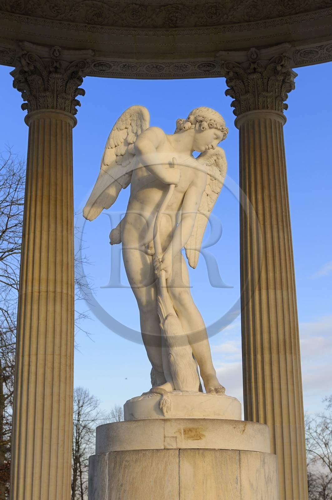 France, Yvelines, Chateau de Versailles, listed as World Heritage by UNESCO, Domaine de Marie Antoinette, the Petit Trianon Garden, the Love Temple, statue by Bouchardon called Cupid Cutting His Bow from the Club of Hercules