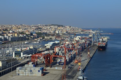 Portugal, Lisbon, the commercial port on Tagus river and the old town in the background