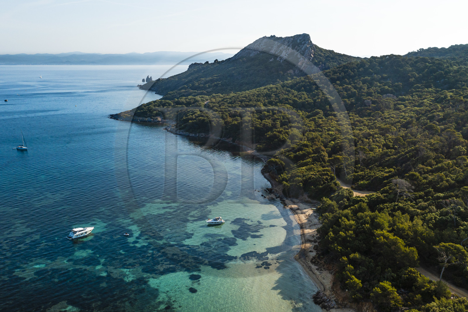 France, Var, Iles d'Hyeres, Parc National de Port Cros (National park of Port Cros), Porquerolles island, Notre-Dame beach in the Bay of Alycastre and the Cap des Medes in the background (aerial view)