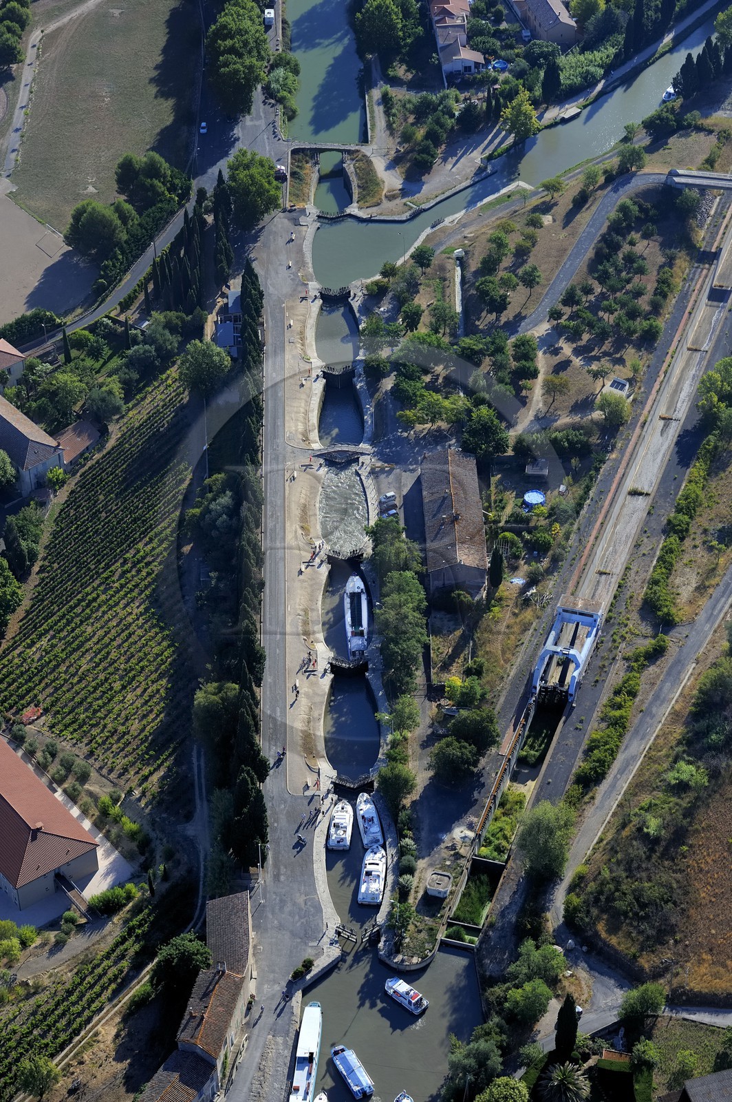 France, Herault, Canal du Midi listed as World Heritage by UNESCO, Beziers, the locks of Fonserannes or Fonseranes build by Pierre-Paul Riquet (aerial view)