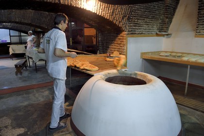 Georgia, Tbilisi, Old City, traditional bakery with a floor oven