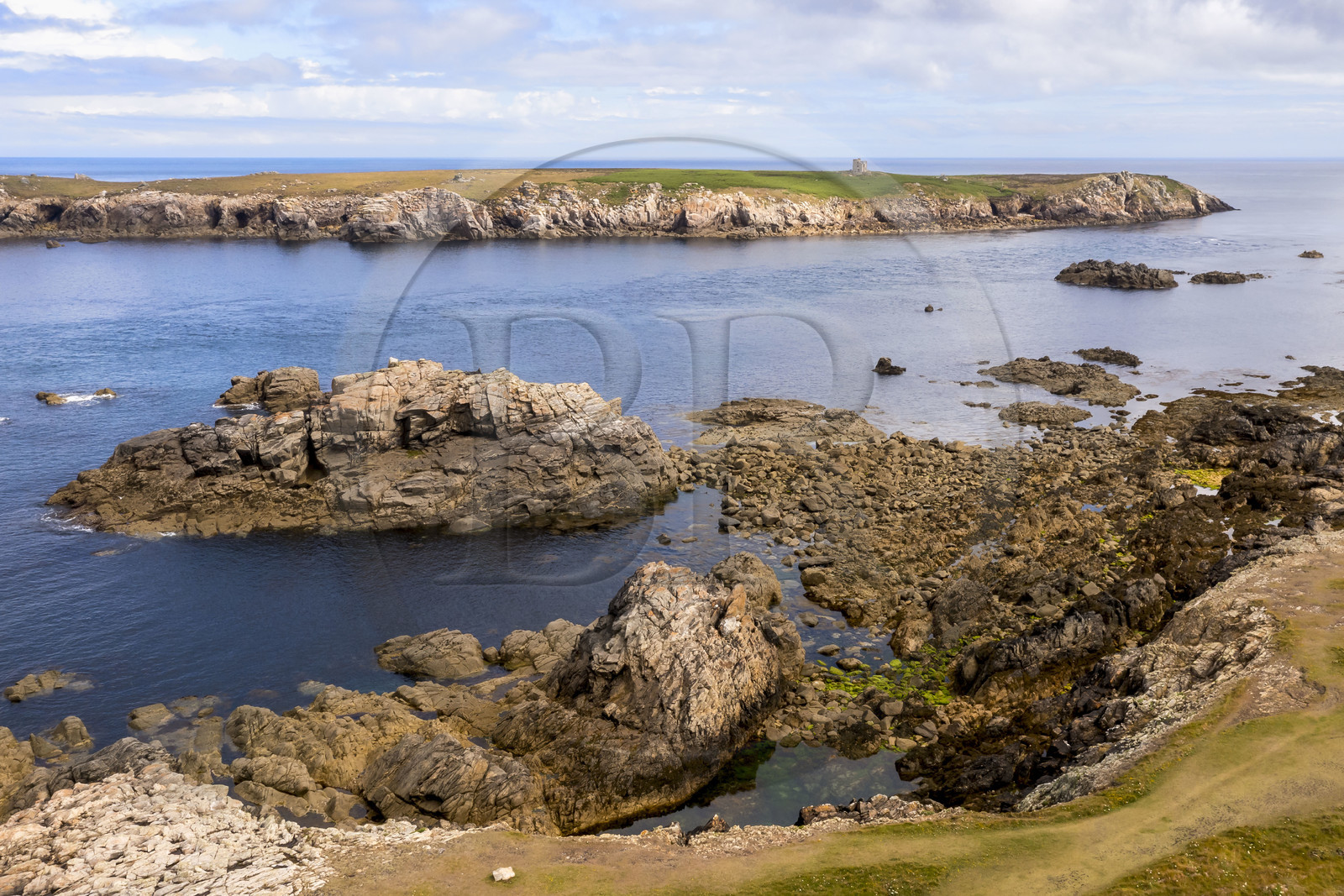 France, Finistère, Iroise Sea, Ouessant Island, Keller Island separated from the north coast by the channel named Penn ar Ru Meur where there is a strong sea current (aerial view)