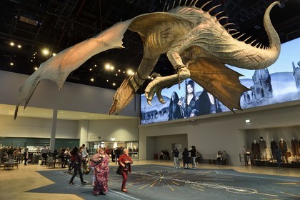 United Kingdom, Hertfordshire, Leavesden, Leavesden Film Studios, Harry Potter Studio Tour London, the scene of the eight Harry Potter movies' making of, giant flying dragon overlooking the visitors at the entrance of the exhibition