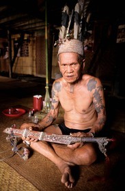 Malaysia, Borneo island, Sarawak, Iban warrior (Dayak ) with his parang (saber)