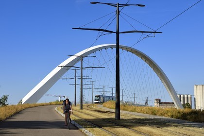 France, Bas Rhin, Strasbourg, the pedestrian, bicycle and tram line D bridge on the Vauban basin connecting Strasbourg to Kehl in Germany called Citadel Bridge in the former Autonomous Port of Strasbourg