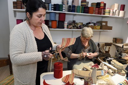 France, Pyrenees Atlantiques, Basque Country, Saint Jean Pied de Port, Albertine Arangois and her daughter Patricia in their shop and craft factory of espadrilles
