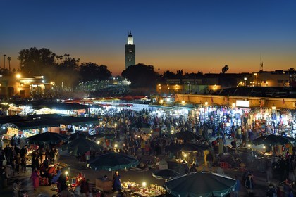 Morocco, High Atlas, Marrakech, Imperial city, Medina listed as World Heritage by UNESCO, Jemaa el-Fna square and the minaret of the Koutoubia mosque in the background
