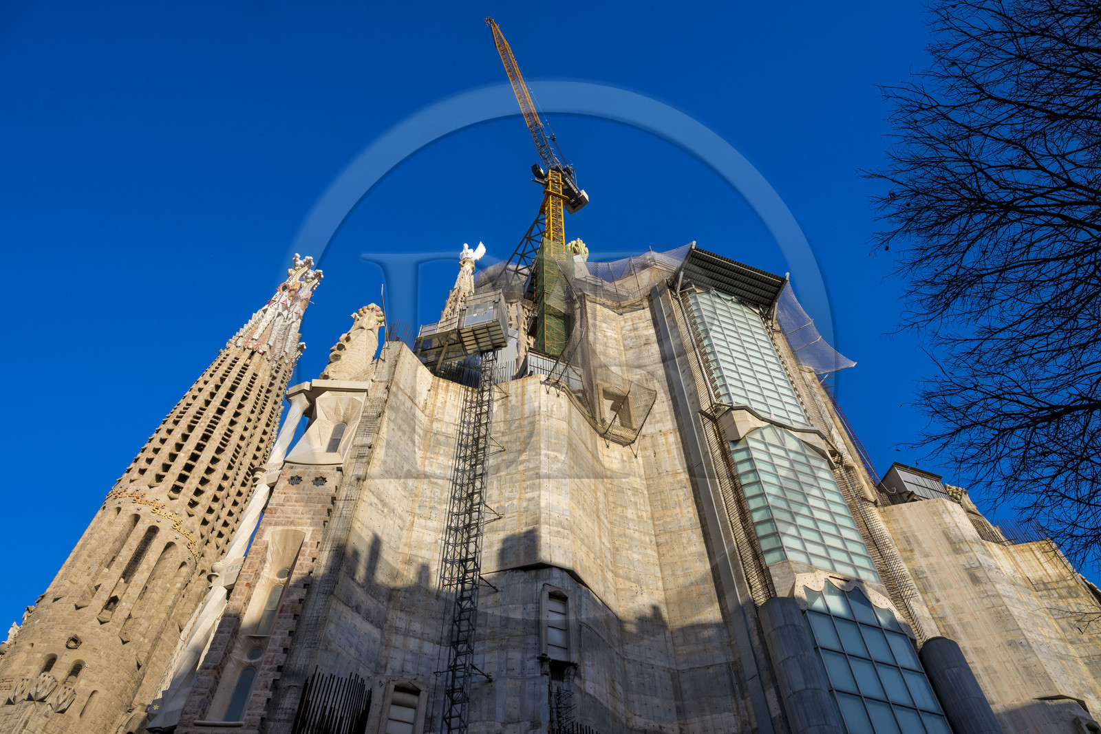 Spain, Catalonia, Barcelona, Eixample district, Sagrada Familia basilica by Catalan modernist architect Antoni Gaudi, listed as a UNESCO World Heritage Site, the Glory facade under construction