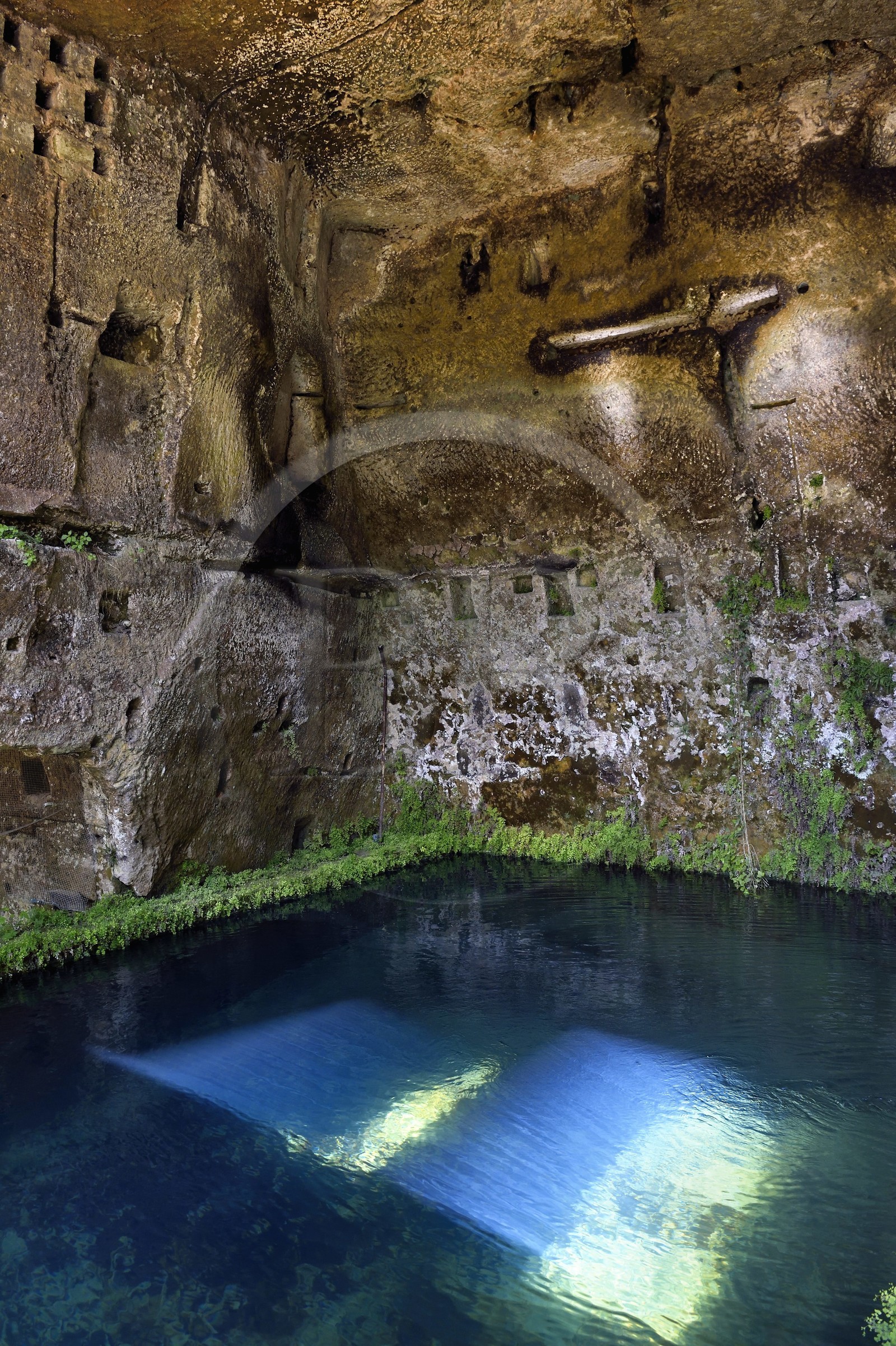 France, Dordogne, Brantome, Saint Pierre benedictine abbey, remains of the first troglodyte monastery built in the caves at the foot of the cliff, the water reservoir of the former troglodyte mill