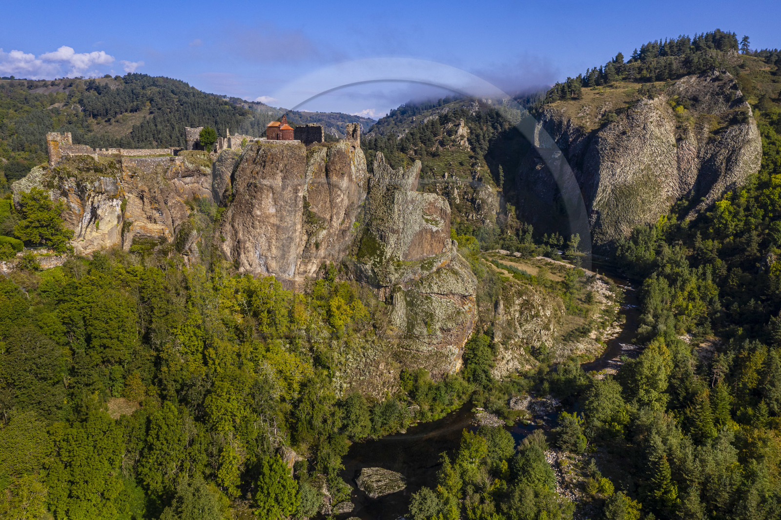 France, Haute Loire, Loire river Valley, Arlempdes, labelized the Most Beautiful Villages of France, ruins of the castle perched on a basalt rock (volcanic dyke) overlooking a Loire river meander (aerial view)