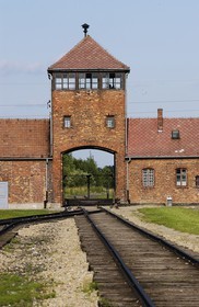 Poland, Lesser Poland, Krakow area, Oswiecim village, death camp of Auschwitz Birkenau, main door and the place where the train used to arrive