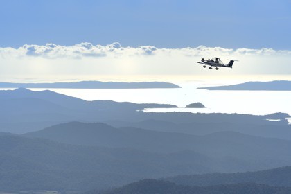 France, Var, Massif des Maures, Colomban Cri-cri (English: the chirp-chirp sound made by a cricket) is the smallest twin-engined manned aircraft in the world designed in the early 1970s by French aeronautical engineer Michel Colomban (aerial view)
