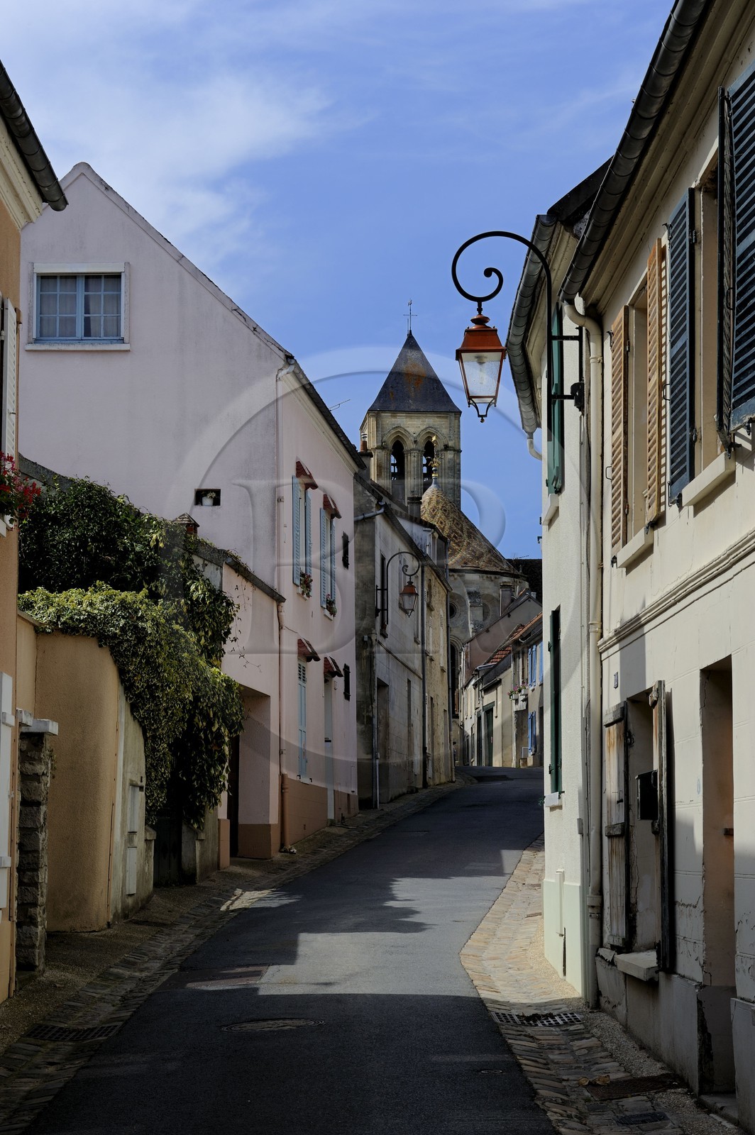 France, Val-d'Oise, Vetheuil, rue de Moutier leading to the Notre Dame church painted by Claude Monet