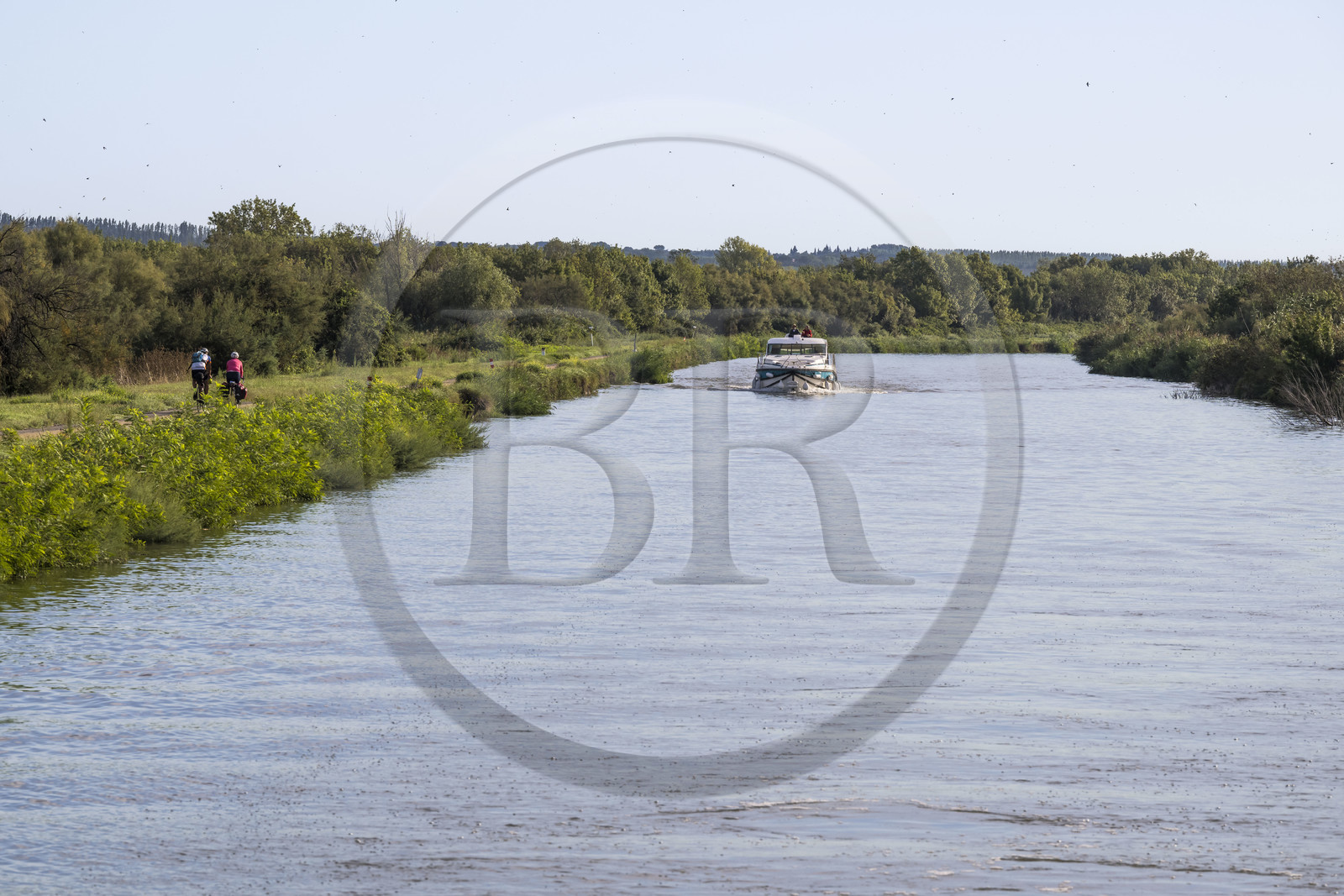 France, Gard, the Petite Camargue, Vauvert, navigation of a pleasure boat on the Rhone to Sète Canal at Gallician