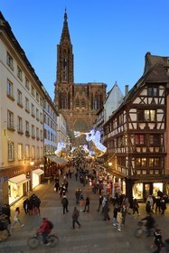 France, Bas Rhin, Strasbourg, old town listed as World Heritage by UNESCO, the western facade of Notre Dame Cathedral and rue Merciere with its Christmas decorations