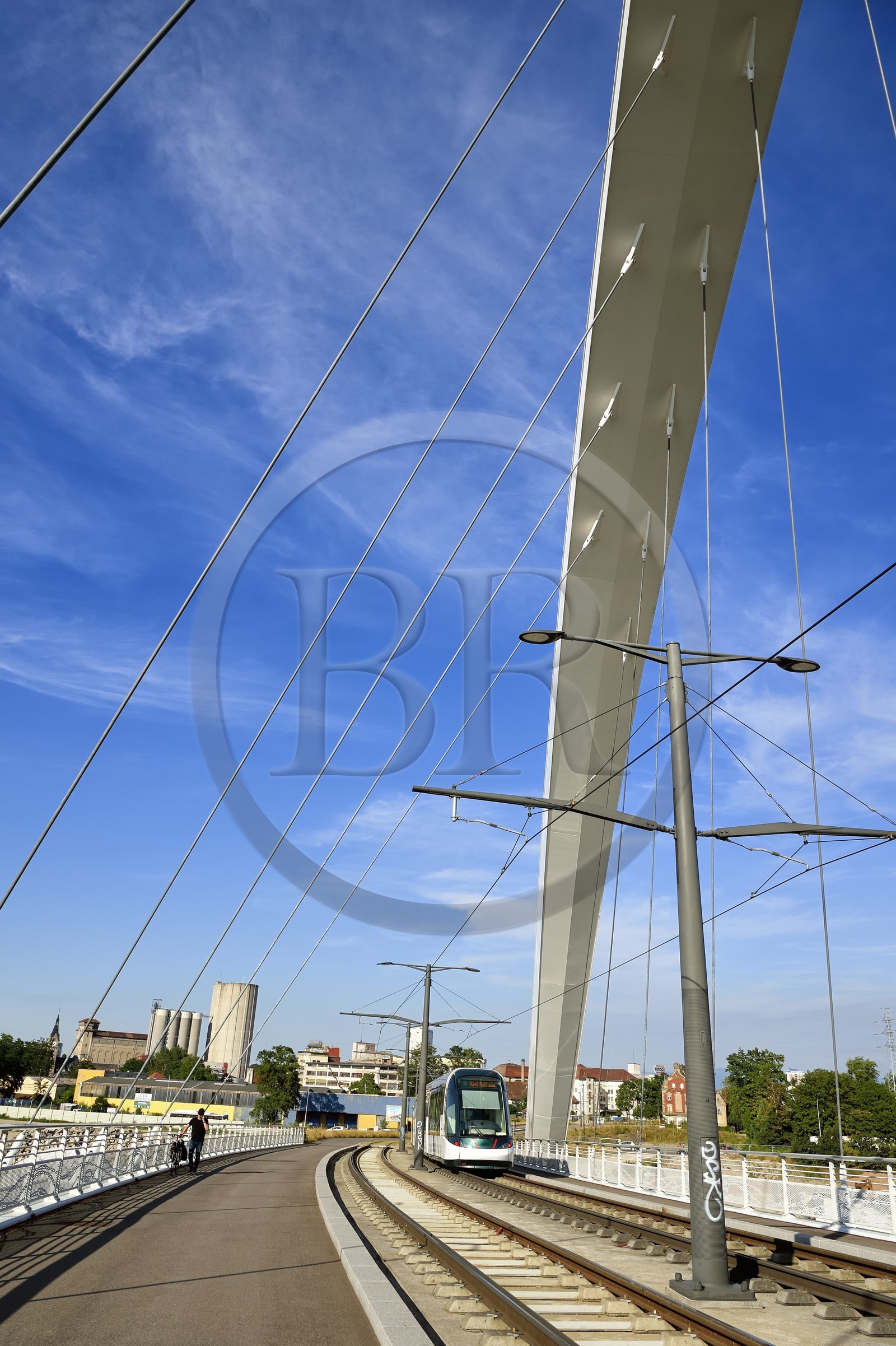 France, Bas Rhin, Strasbourg, the pedestrian, bicycle and tram line D bridge on the Vauban basin connecting Strasbourg to Kehl in Germany called Citadel Bridge in the former Autonomous Port of Strasbourg