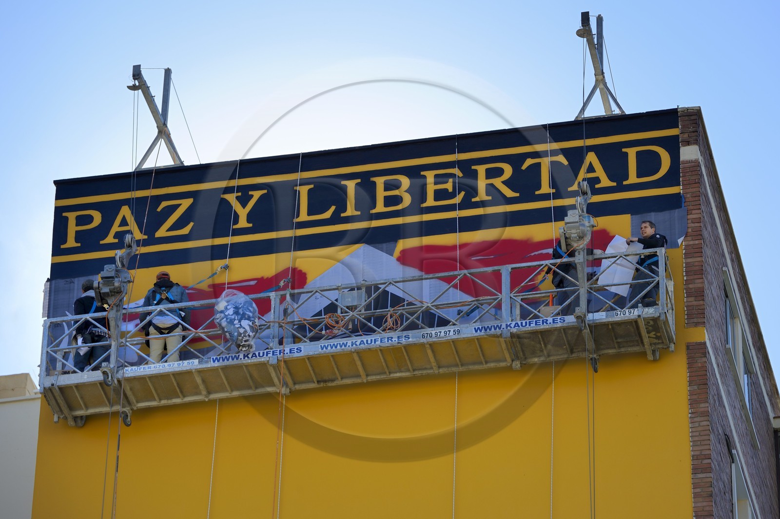 Spain, Andalusia, Malaga, Soho district, barrio de las Artes (Arts District), Maus street art, creation of a mural by Obey Giant directed by Frank Shepard Fairey (right on the bridge)