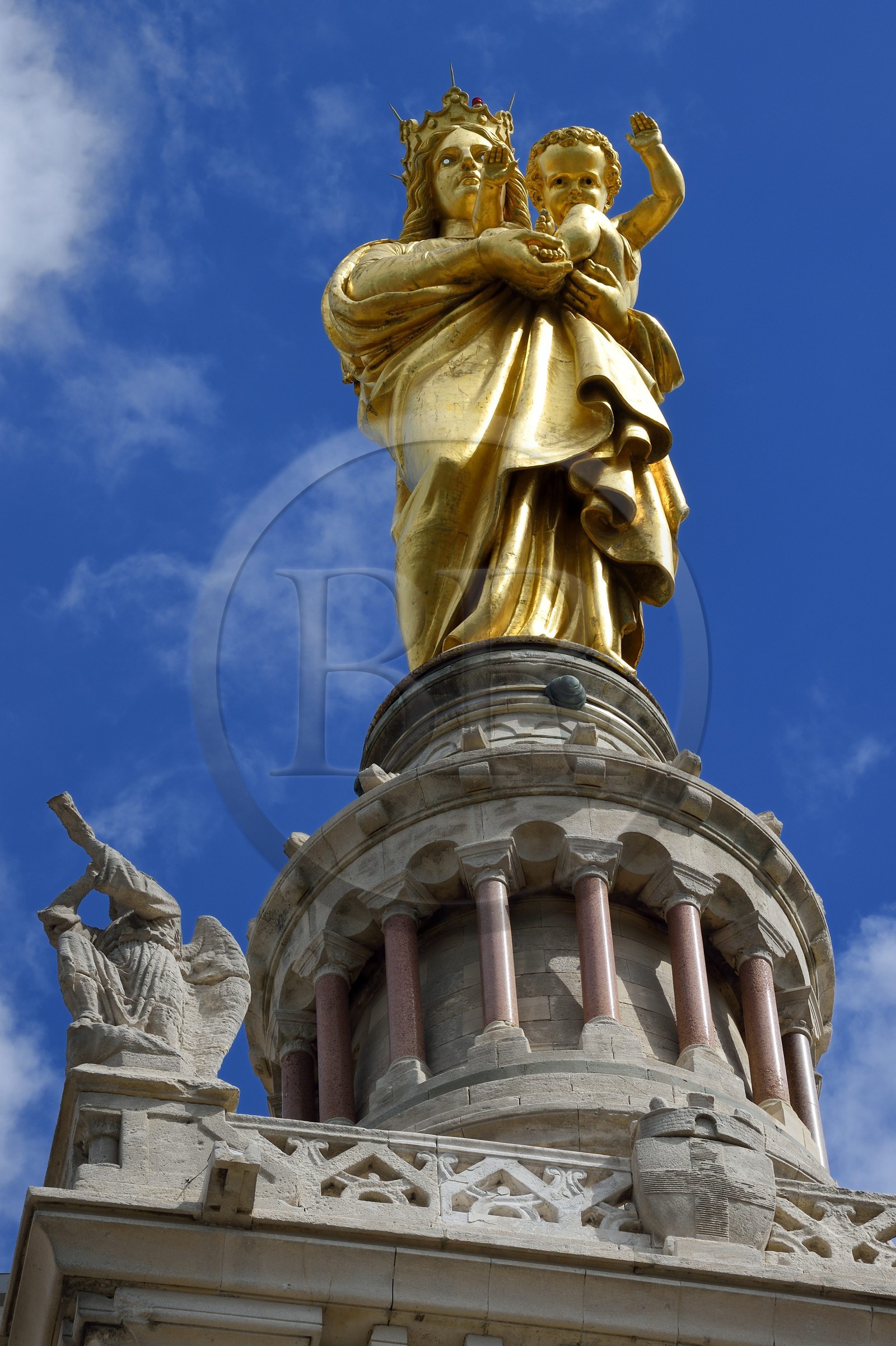 France, Bouches du Rhone, Marseille, Notre-Dame de la Garde basilica, statue of the Virgin and child overlooking the basilica