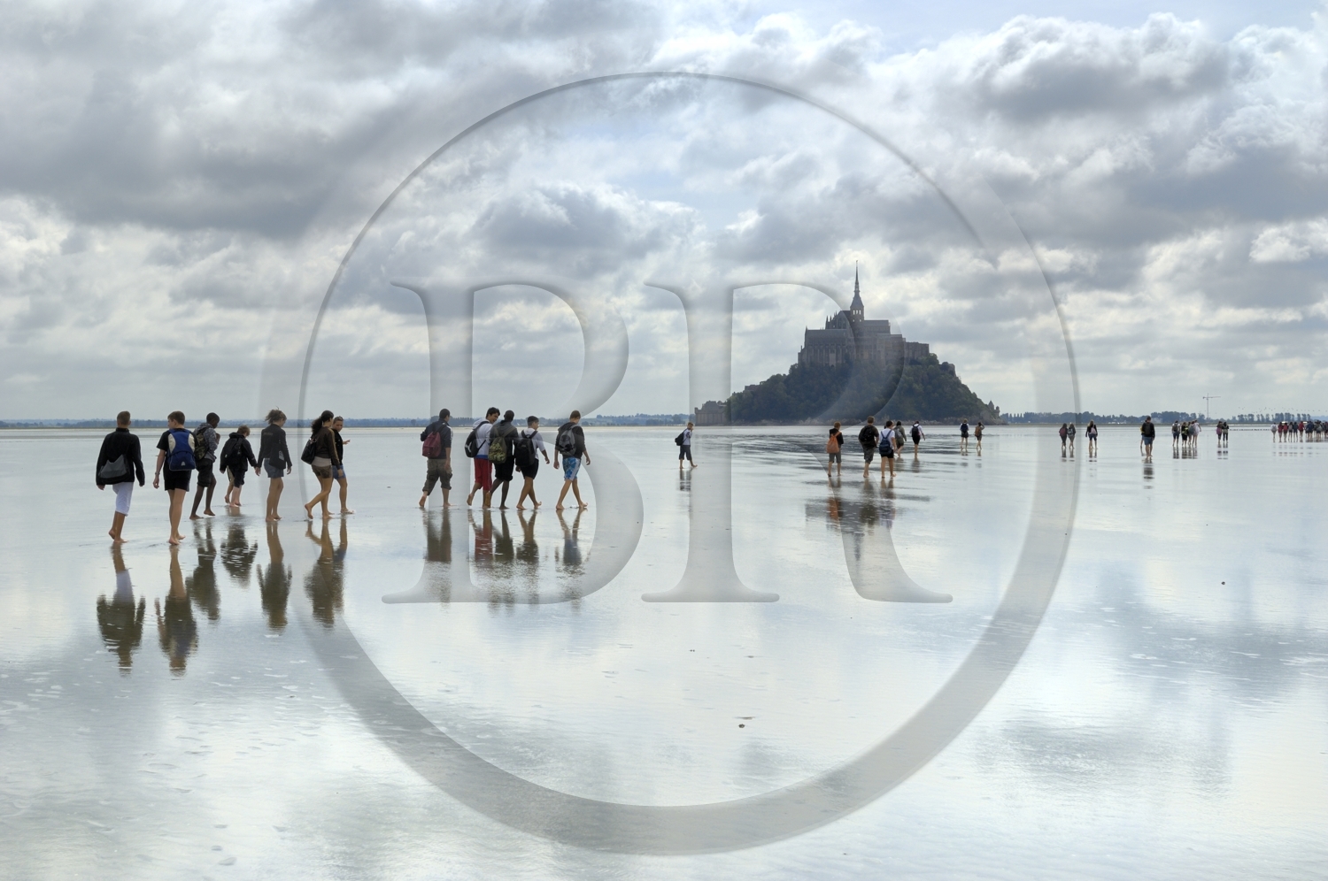 France, Manche, crossing on foot the Bay of Mont Saint Michel, listed as World Heritage by UNESCO