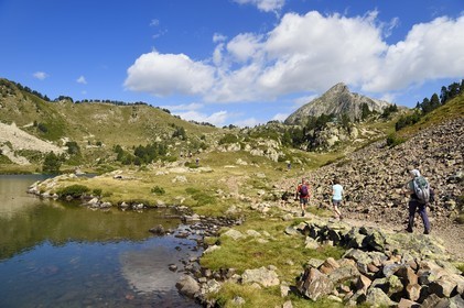 France, Hautes Pyrenees, Saint Lary Soulan and Vielle-Aure, hike on a variant of the GR10 between the Portet pass and the Bastan lakes on the edge of the Neouvielle nature reserve, middle Bastan lake and the Pic de Bastan in the background