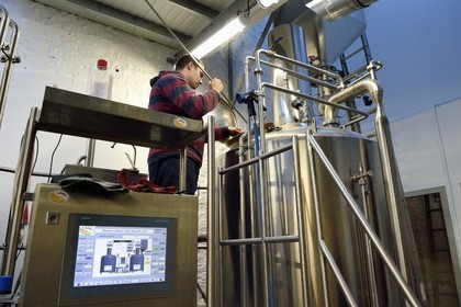 France, Seine-Maritime, Pays de Caux, Norman Seine River Meanders Regional Nature Park, Saint Wandrille Rançon, abbey of Saint-Wandrille de Fontenelle, the monk brother Matthieu making the beer Abbey Saint Wandrille