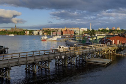 Sweden, Stockholm, the bridge leading over to Beckholmen island and the district of Saltsjöqvarn in the background