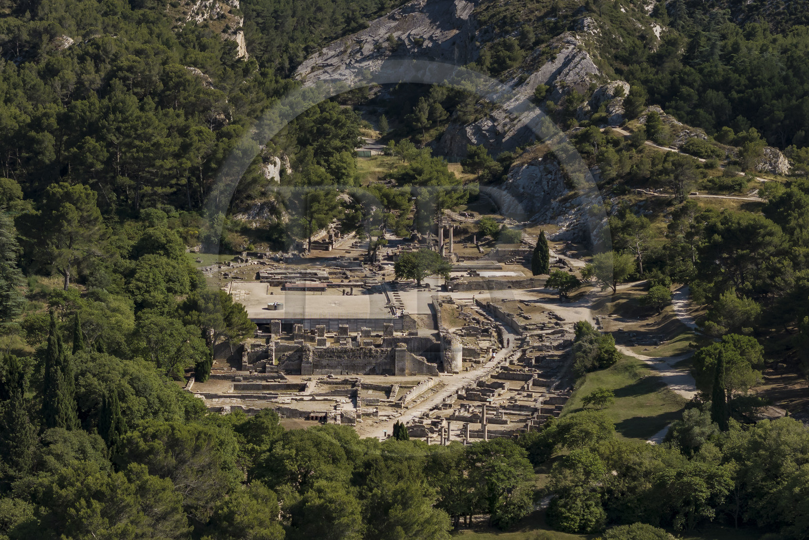 France, Bouches du Rhone, Regional Natural Park of the Alpilles, Saint Remy de Provence, site archéologique de Glanum (aerial view)