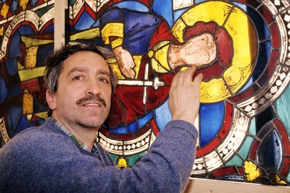 Italy, Tuscany, Siena, Duccio di Buoninsegna stained glass window restoration at the Siena Cathedral (Duomo)