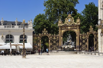 France, Meurthe-et-Moselle, Nancy, Place Stanislas (former Place Royale) built by Stanislas Leszczynski in the 18th century, listed as World Heritage by UNESCO, Amphitrite Fountain and golden gate by Jean Lamour