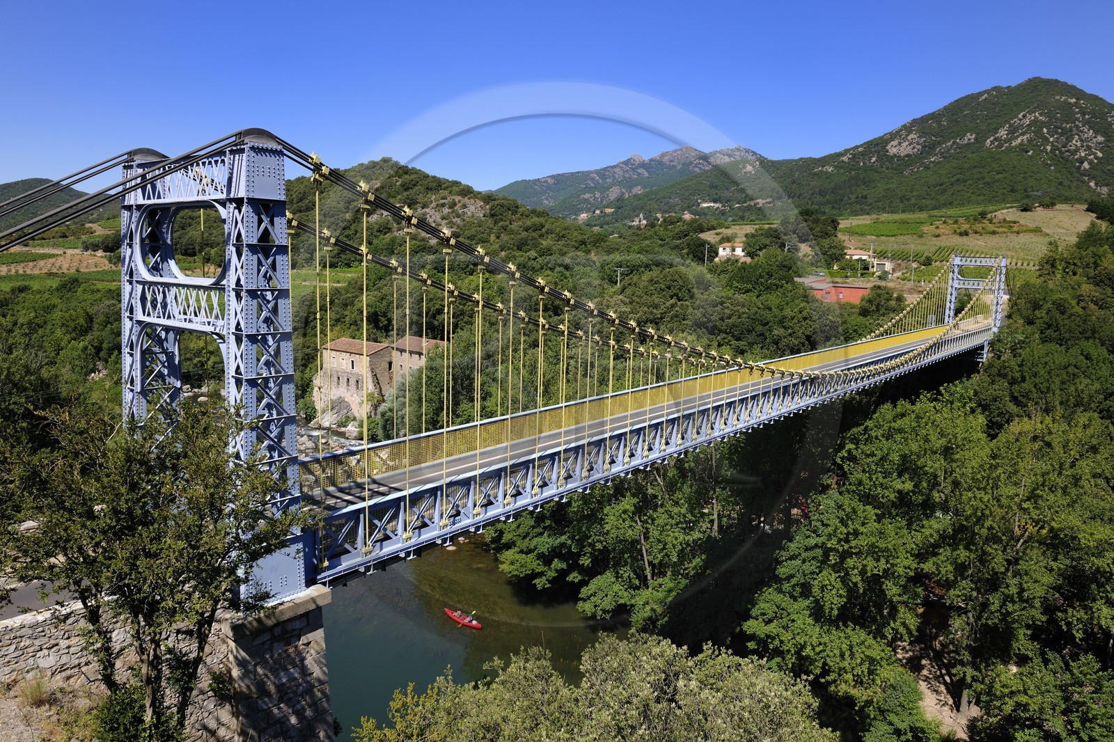 France, Herault, Orb valley, the suspension bridge over the river Orb at the moulin de Travassac next to Mons la Trivalle