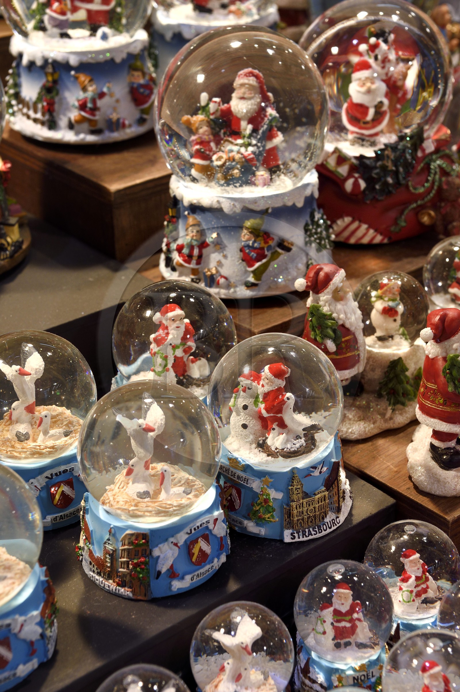 France, Bas Rhin, Strasbourg, old town listed as World Heritage by UNESCO, Christmas market (Christkindelsmarik) on the place Broglie, snow globe with Santa