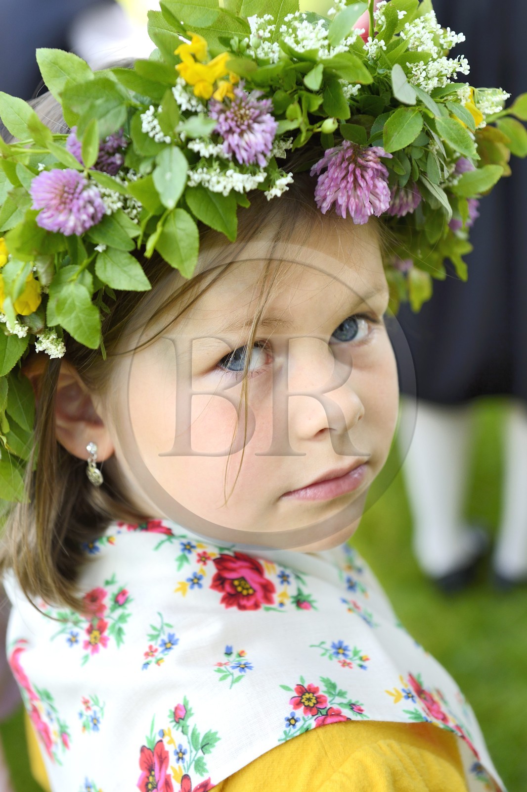 Sweden, Dalarna County, Leksand area, girl in traditional costume for the Midsummer celebrations in the tiny hamlet of Sunnanäng