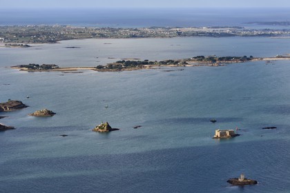 France, Finistere, Morlaix bay, Carantec, lighthouse of Louet island (also a guest house in summer) and the Chateau du Taureau, in the background the Callot island and the peninsula of Roscoff (aerial view)