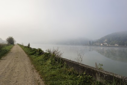France, Seine-Maritime, Le Bas Mauny located in the Eure department in the mist downstream the village of La Bouille on the left bank of the Seine