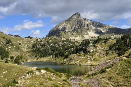 France, Hautes Pyrenees, Saint Lary Soulan and Vielle-Aure, hike on a variant of the GR10 between the Portet pass and the Bastan lakes on the edge of the Neouvielle nature reserve, middle Bastan lake and the Pic de Bastan in the background