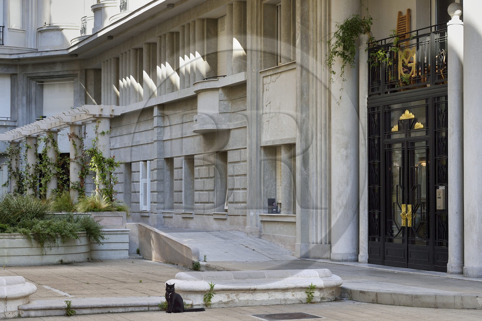 France, Alpes-Maritimes, Nice, Baumettes district, the Gloria Mansions Art deco building, the main entrance in the courtyard