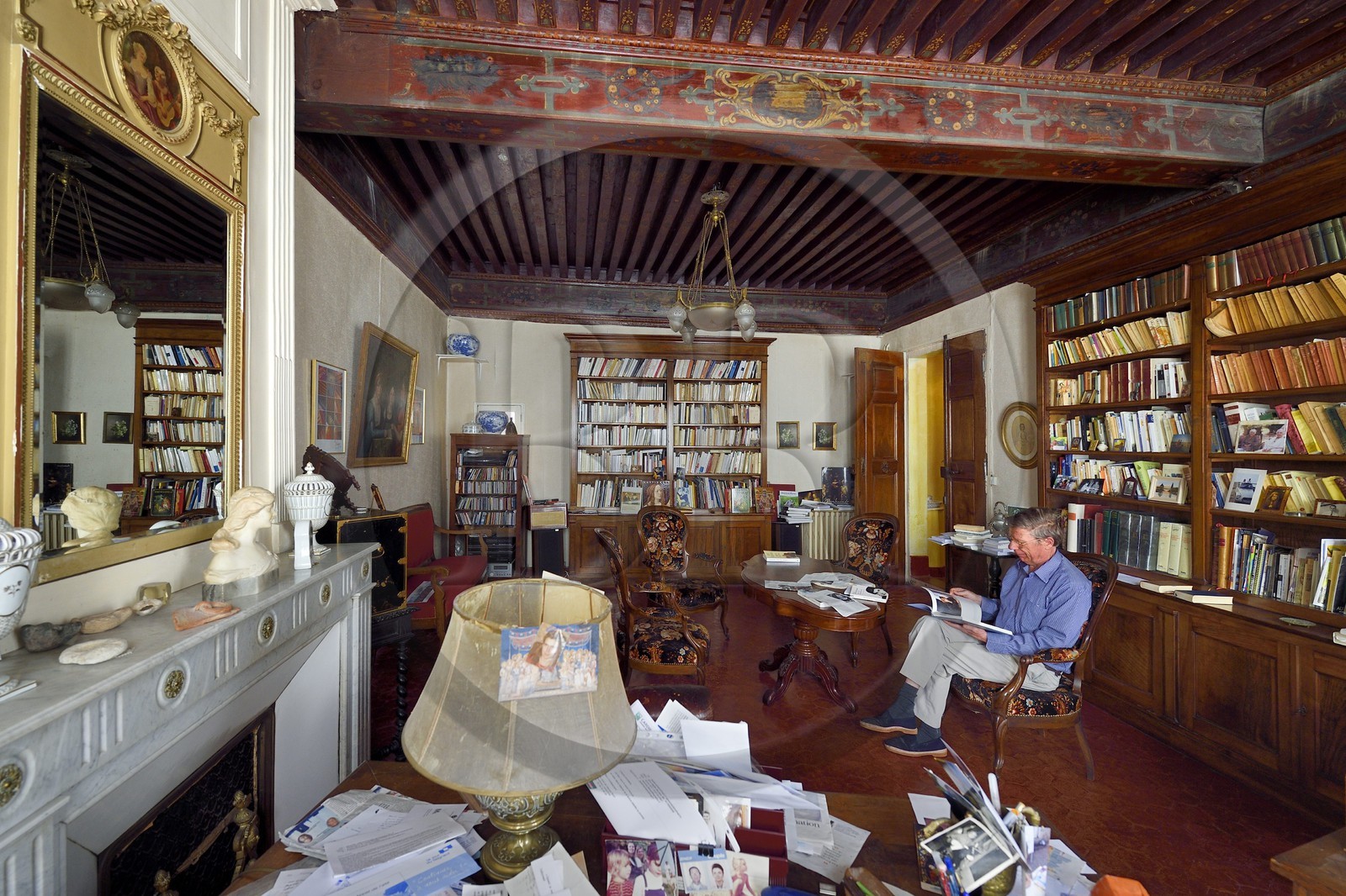 France, Bouches du Rhone, Arles, François Debost in the living room of his hotel de Donine (mansion)