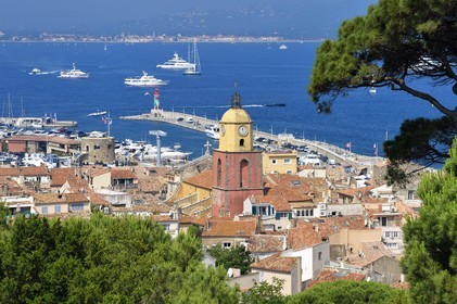 France, Var, Saint-Tropez, Notre Dame de l'Assomption parish church seen from the citadel, Grimaud in the background