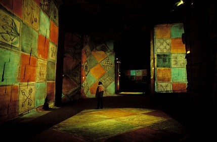 France, Bouches du Rhone, Les Baux de Provence village, labelled Les Plus Beaux Villages de France (The Most Beautiful Villages of France), play of light, pictures cathedral in the former quarry