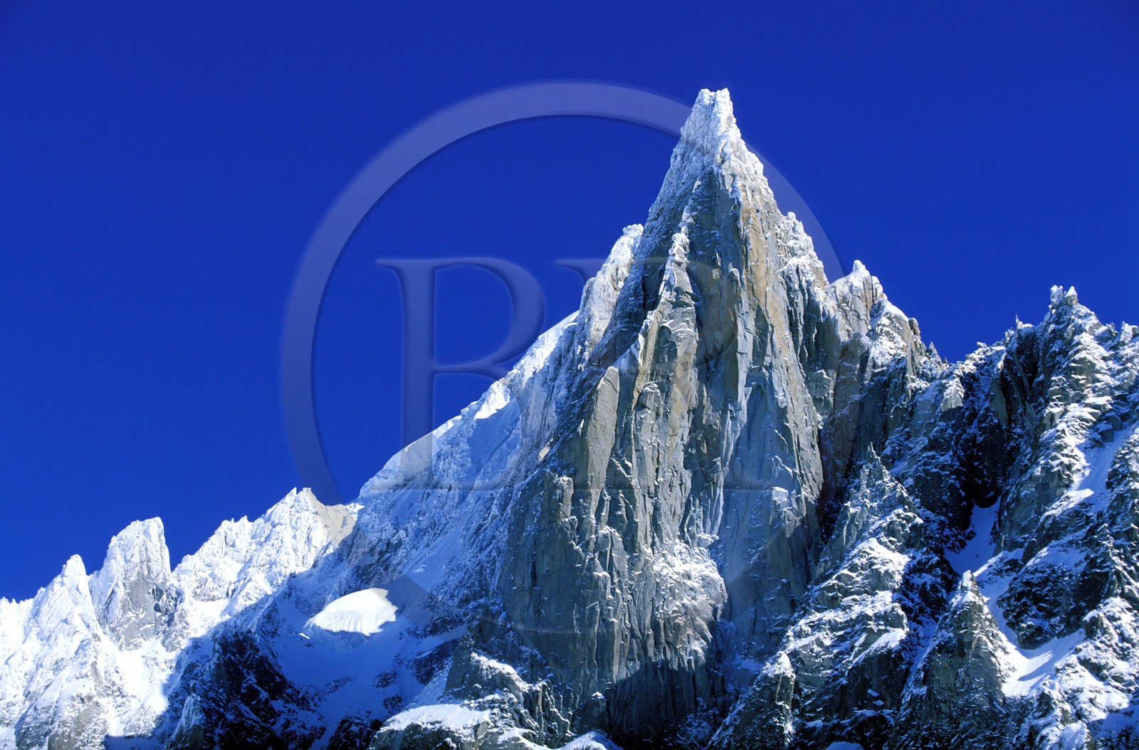 France, Haute Savoie, Chamonix valley, Mer de glace in the Vallee Blanche, Mont Blanc, Aiguille of the Dru at the summit of the Aiguille verte